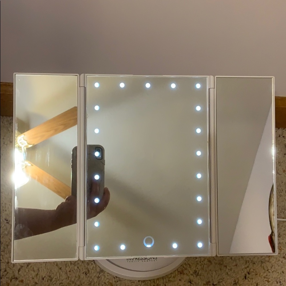 Impressions vanity mirror